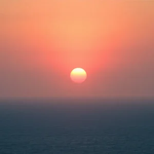 Scenic view of a hazy sunset influenced by Sahara dust