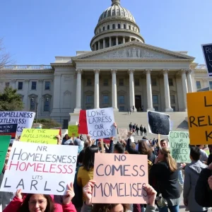 Submit Obituary Travelers Aid Society rally at the state capitol to advocate for homelessness solutions